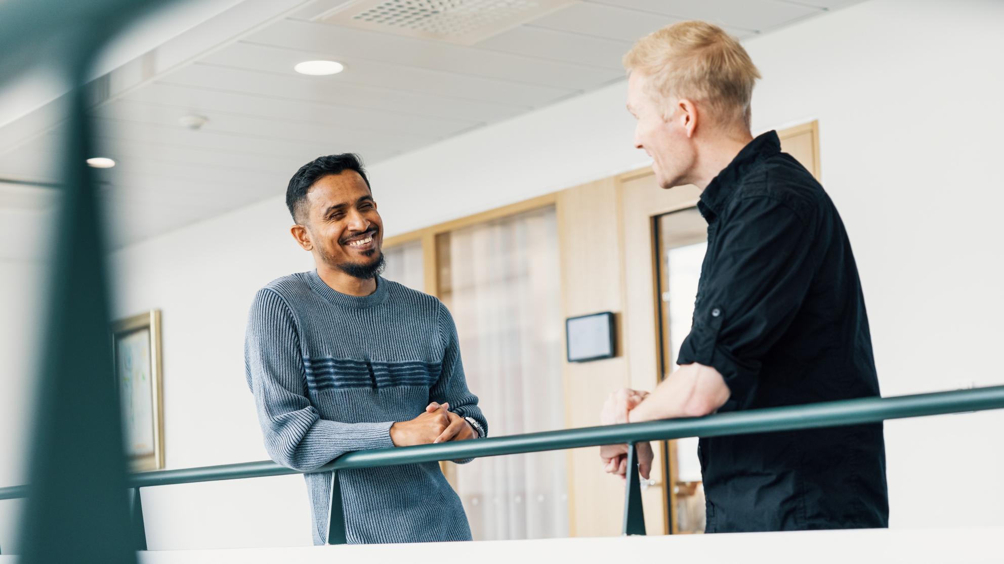 two people discussing