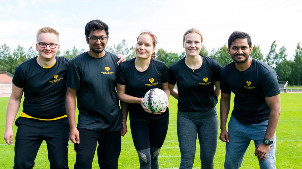 Students playing football.