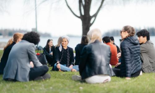 Students sitting at the University of Vaasa campus
