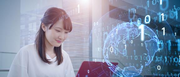 A young woman sitting in front of a laptop, with digital numbering overlaying the image. Digital representation of earth on right, overlaying the image.