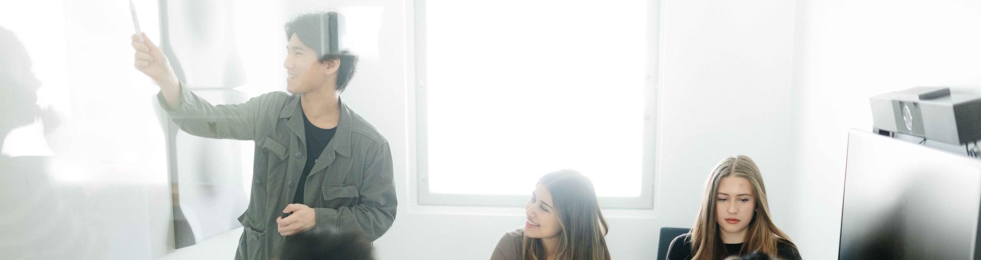 Group of students in a small meeting room