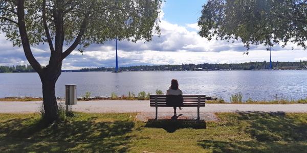 Adriana enjoying sunny summer weather and looking at the sea from the campus park
