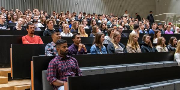 International students at Levón auditorium