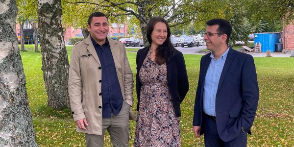 Bahaa Eltahawy, Petra Berg and Mazaher Karimi outside on the University of Vaasa campus.