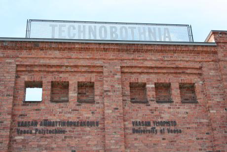 A Technobothnia sign on the roof of the old factory building