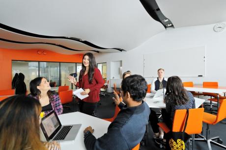 Learning environment on the 1st floor of Tervahovi Students gathered around a round table